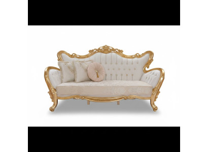 A luxurious and relaxing sofa in a classic style with golden patterns.