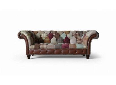 Colorful designer sofa in Chesterfield design with three seats