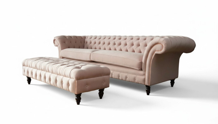 A luxurious pink four-seater sofa in Chesterfield design, including seat cushions