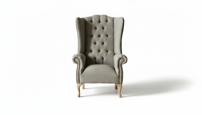 Gray wingback armchair armchair design upholstery Chesterfield fabric living room