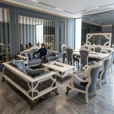 Luxurious living room set with 2x 3-seater sofas, two armchairs, and coffee table.