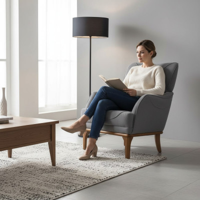 Comfortable gray armchair made from luxurious fabric for the living room, new.