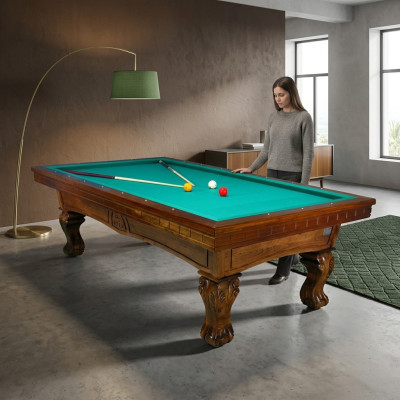 Brown solid wood billiard table with hand-carved legs