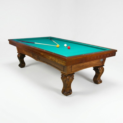 Brown solid wood billiard table with hand-carved legs