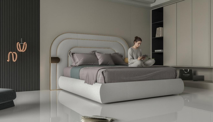 Luxury gray bed with gold details in modern design and upholstered headboard