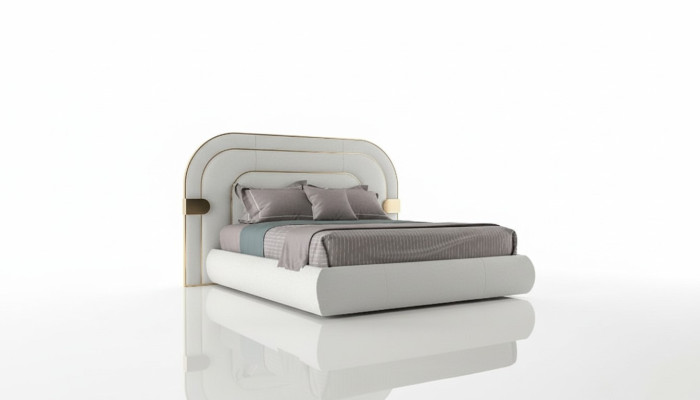Luxury gray bed with gold details in modern design and upholstered headboard