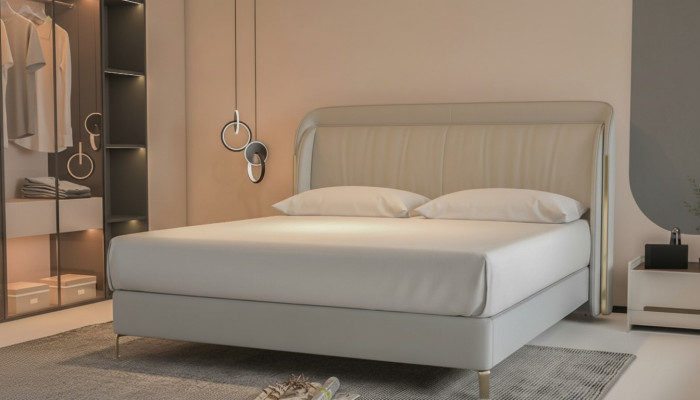 Modern luxury bed with elegant gold headboard in gray