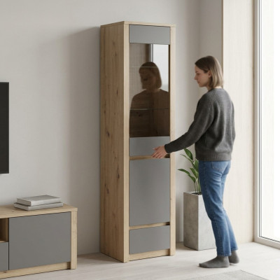 Glass display cabinet with glass doors, glass shelves, and drawer
