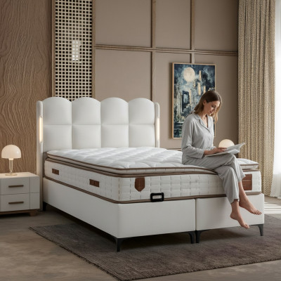 Elegant white bed with modern mattress