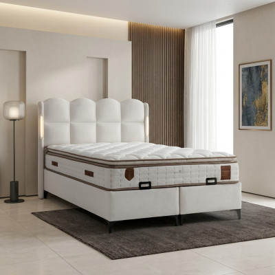 Elegant white bed with modern mattress