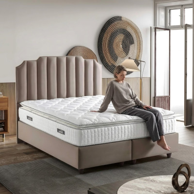 Elegant bed with modern beige fabric mattress