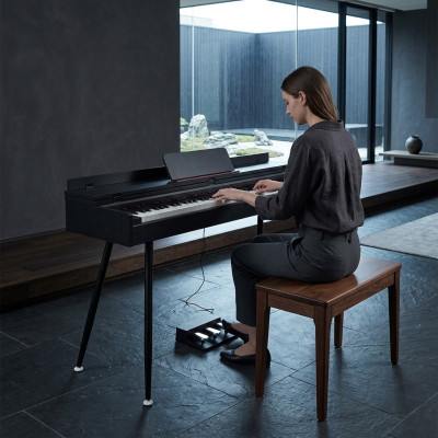 Black glossy digital piano for home