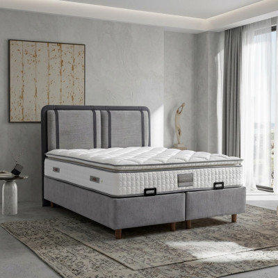 An elegant and stable bed with mattress that adds charm to the decor.