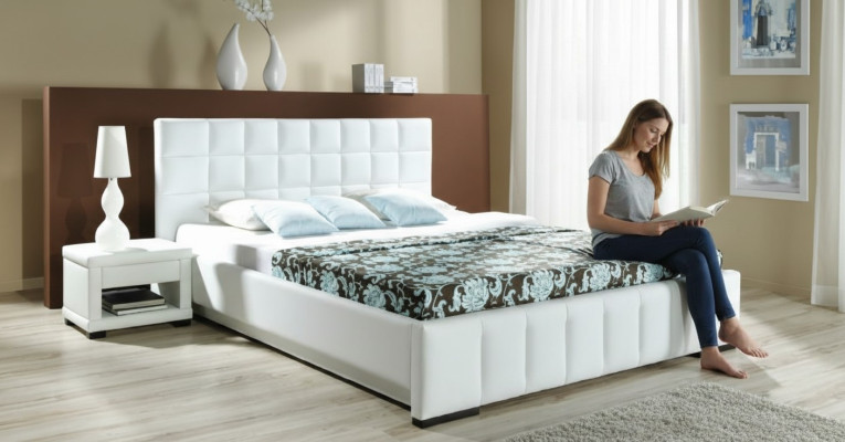 A luxurious designer bed in an elegant contemporary style of the highest quality